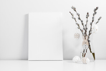 Easter holiday composition. White linen blank canvas mockup, vase with willow plant branches,...