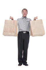 senior man with shopping bags . isolated on a white background.