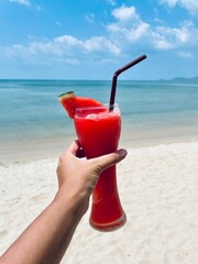 delicious watermelon shake on the background of the sea