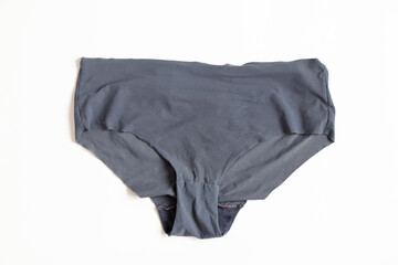 Women's old panties on a white background, close-up underwear