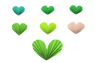Paper accordion hearts in green and beige colors on a transparent background. Spring inspiration and decoration for your collage, artwork.