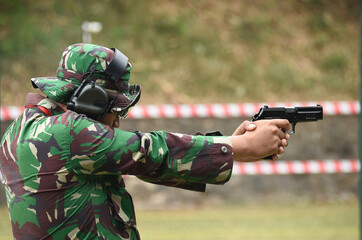 Person with rifle