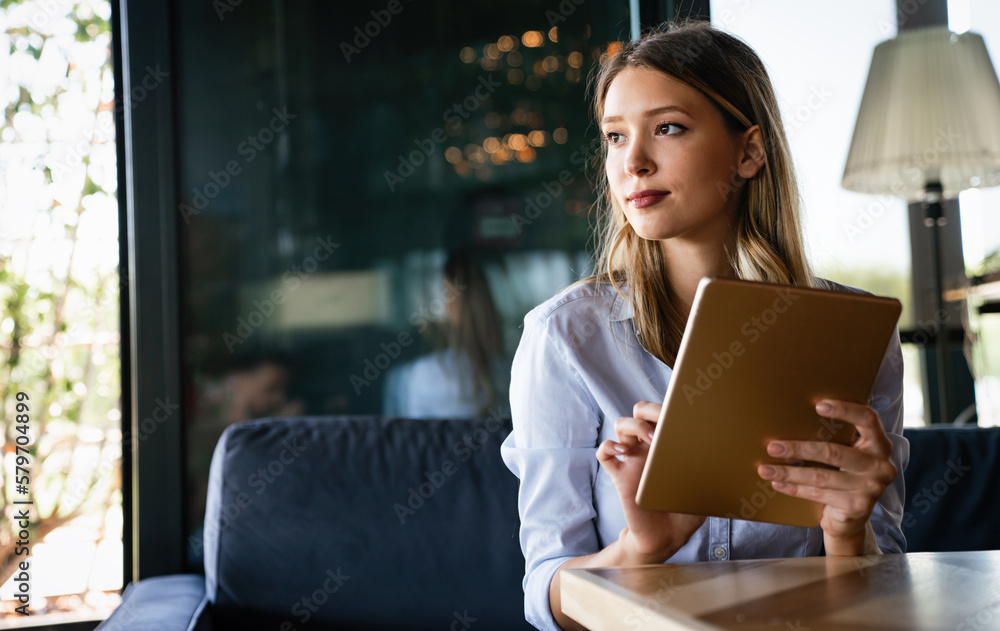 Wall mural Portrait of happy beautiful successful business woman, manager working