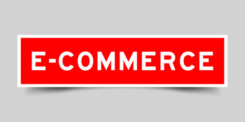 Sticker label with word e-commerce in red color on gray background