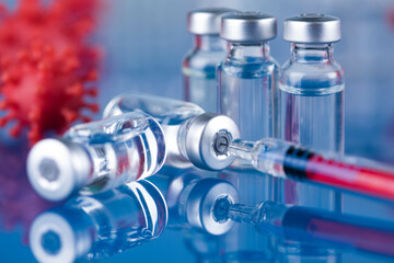 Close up medical syringe with a vaccine