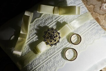 Wedding rings in a beautiful design. The concept of a wedding or engagement