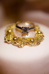 Wedding rings in a beautiful design. The concept of a wedding or engagement