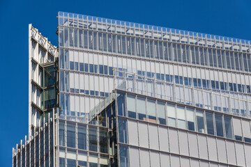 Exterior of modern office building in city of London with glass windows