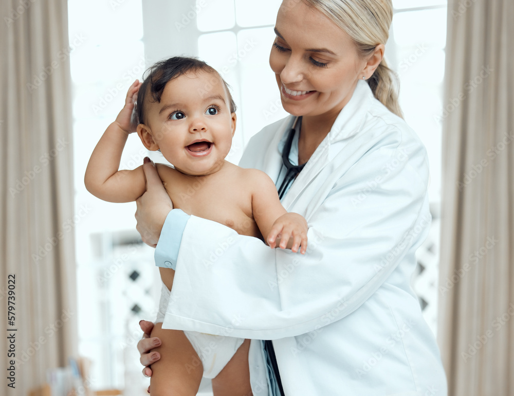 Canvas Prints When baby is healthy, baby is happy. Shot of a paediatrician examining a baby in a clinic.