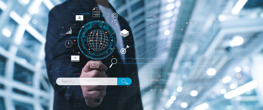 Businessman holding magnifying glasss earch for Browsing Internet Data Information Networking Concept