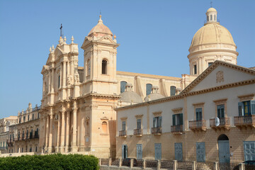Fototapeta na wymiar The Cathedral of Noto is a jewel of Sicilian baroque that is located on the main street full of other masterpieces of Baroque architecture.