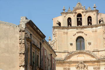 Fototapeta na wymiar Noto is the capital of Sicilian Baroque with its golden stone masterpieces, sumptuous palaces full of bas-reliefs, churches such as the Madonna del Carmine.