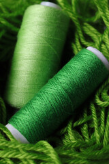green thread and needle