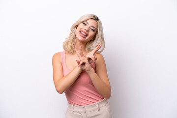 Young Russian woman isolated on white background smiling and showing victory sign