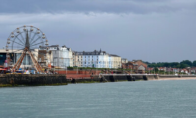 Obraz premium A view of the seafront from across the sea at Bridlington in the East Riding of Yorkshire, England, UK. 