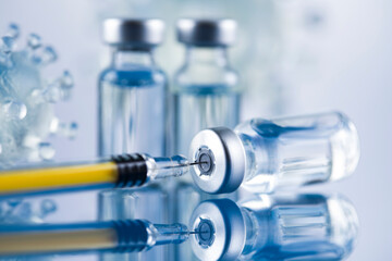 Close up medical syringe with a vaccine