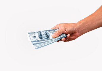 Hand holding 100 American dollars isolated on white background. Money in hand.