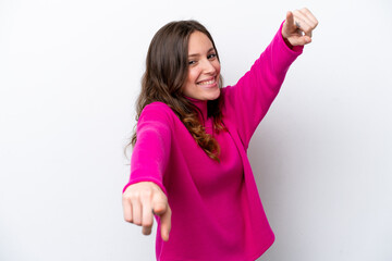 Young caucasian woman isolated on white background pointing front with happy expression