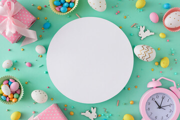 Easter celebration concept. Flat lay photo of white circle colorful easter eggs cute rabbits gift...