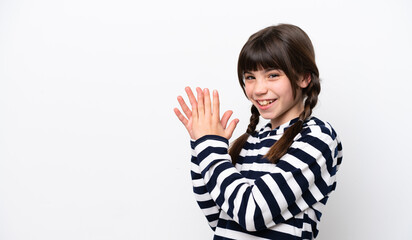 Little caucasian girl isolated on white background scheming something