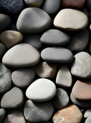 Fototapeta na wymiar pebbles and stones on a black background