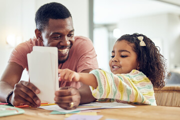 Home school, learning and father helping his child with flash cards, homework or studying. Education, knowledge and African man teaching his young girl kid with reading or an academic assignment. - Powered by Adobe
