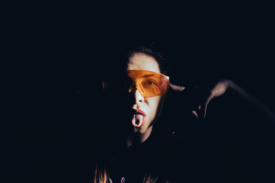 Girl in smart yellow glasses. Virtual reality glasses. Atmospheric fashion photos.