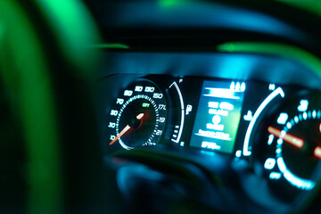 Abstract kilometer, in car, blue and green, digital
