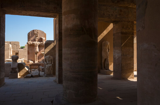 Luxor, Egypt - October 11, 2022: Karnak Temple complex, ancient egyptian columns and statue ruins