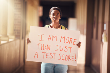 Education, protest and student with a poster at a college for scholarship, debt and school loans....