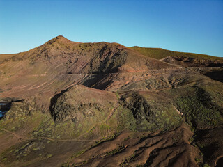 Aerial view of mountain and road near Las Coloradas, in La Isleta, Las Palmas de Gran Canaria, Spain