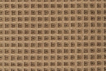 multicolored terry towels, rolled up and stacked on the table