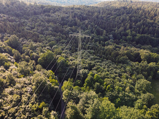 Panoramic view of wind farm or wind park, with high wind turbines for generatio