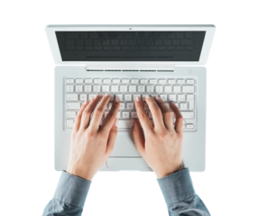 Blogger typing on a laptop