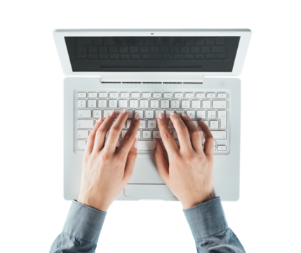 Blogger typing on a laptop