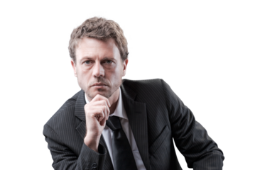 Confident business executive thinking with hand on chin