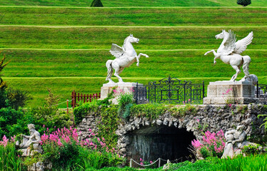 Powerscourt mansion house garden near Enniskerry, Ireland. Winged Pegasus horses horse statues cast...