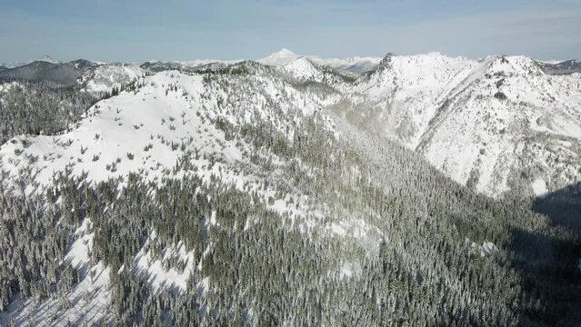 Slow Floating Winter Aerial in Cascade Mountains