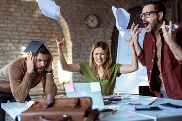 Stressful situation in office, business people working and receiving bad news