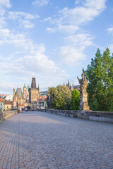 Obraz premium Beautiful view of the Malostranska tower of Charles Bridge at dawn in Prague, Czech Republic