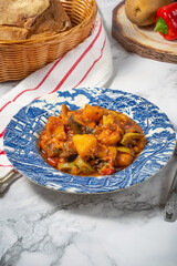 Traditional Greek tourlou or briam made of vegetables, potatoes aubergines, peppers, tomatoes