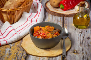 Traditional Greek tourlou or briam made of vegetables, potatoes aubergines, peppers, tomatoes