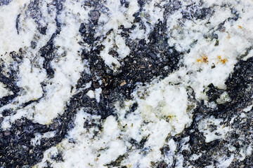 Natural cracked and waves black and gray marble texture for skin tile wallpaper luxurious background, for design art work. Stone ceramic art wall interiors backdrop design