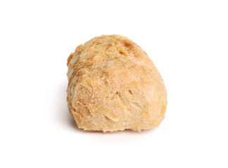 Yak cheese puff microwaved from leftover yak cheese dog chew. Do it yourself puffed up end piece of Himalayan yak milk bone for dogs. Selective focus. Isolated.
