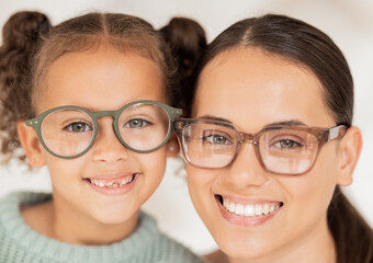 Optometrist, vision and portrait of mother and child smiling together with glasses. Family, healthcare and mom with girl with prescription spectacles for optical sight, eye care and optician eye test