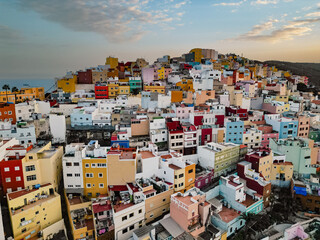 Aerial view of rooftops of colourful houses during sunset in old town in the city of Las Palmas de Gran Canaria, Spain