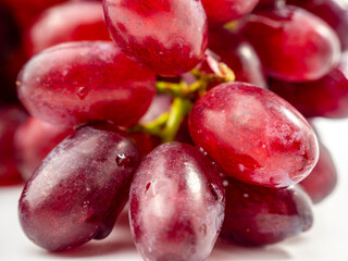 Ripe juicy grapes isolated on white background. Close-up.