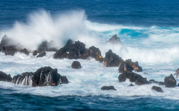 waves breaking on the rocks