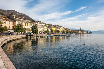 Fototapeta na wymiar The beautiful lakeside of Salò with the Lake Garda and the Monte Baldo in background