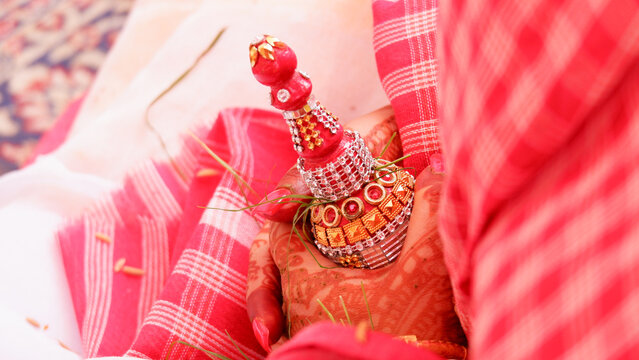 Bengali girl with gach kouto in her marriage.